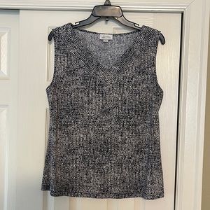 Tahari Sleeveless top can be worn with skirts, jeans, or suit worn once